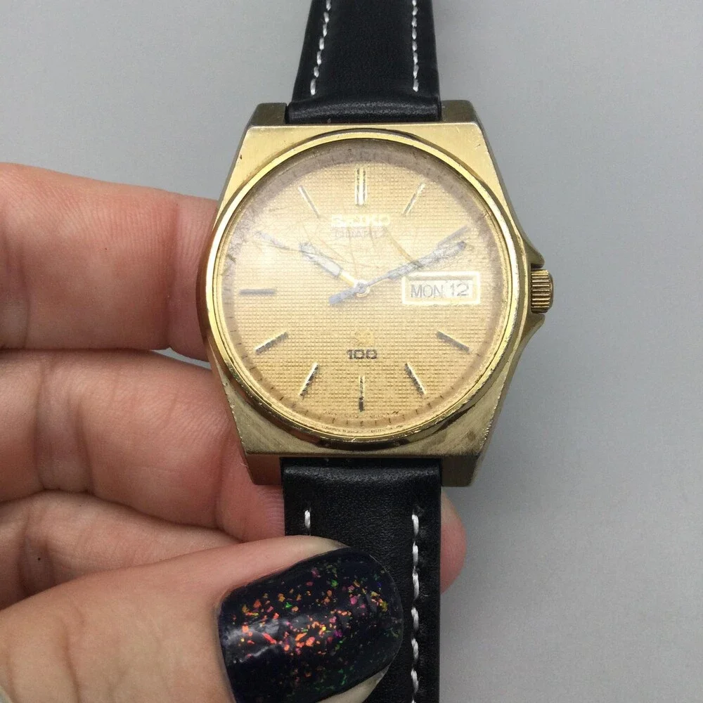 Vintage Seiko SQ 100 Mens Watch 33mm Gold Tone Day Date 6923-8010 New Battery